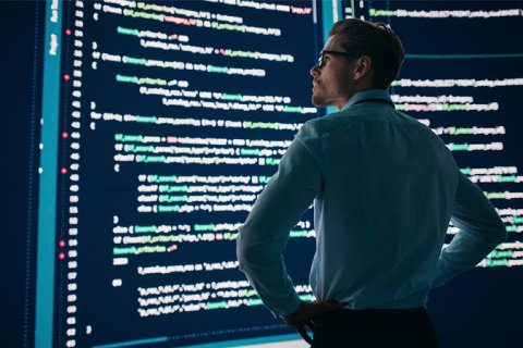 man staring at code